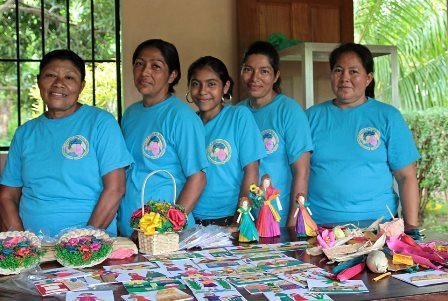 Photograph of Nicaraguan women, all wearing bright blue tshirts.