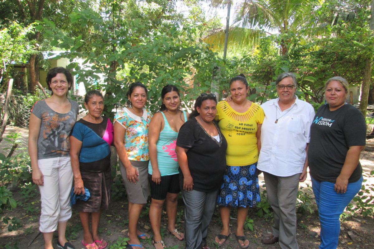 Group of women standing outside with ESPERA staff.