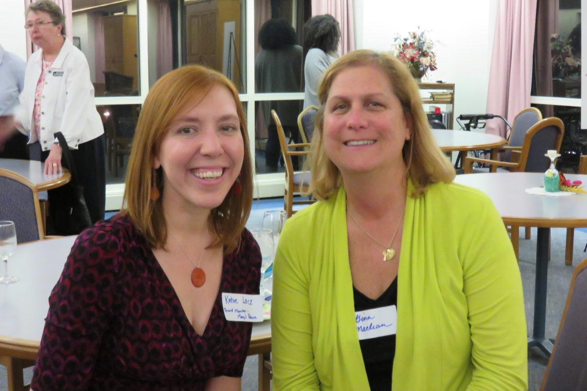 Photograph of Katie and a donor at a reception.