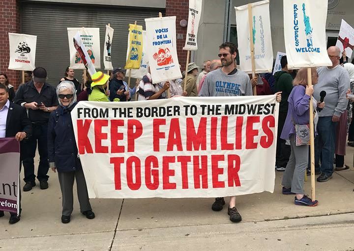 Milwaukee New Sanctuary Movement with "Keep Families Together" sign