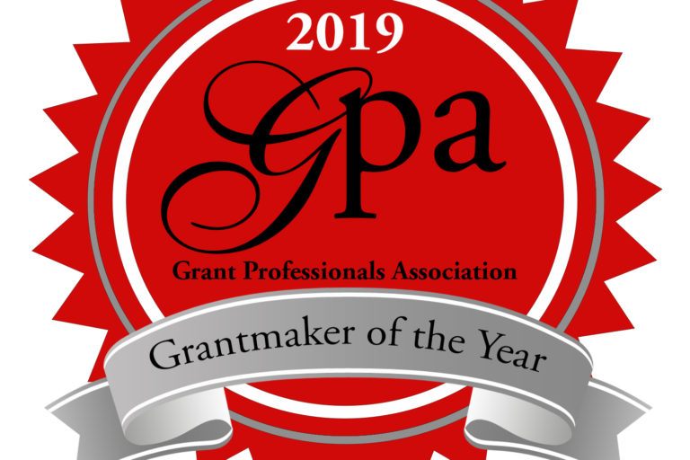 Seal for 2019 Grantmaker of the Year Award from Grant Professionals Association