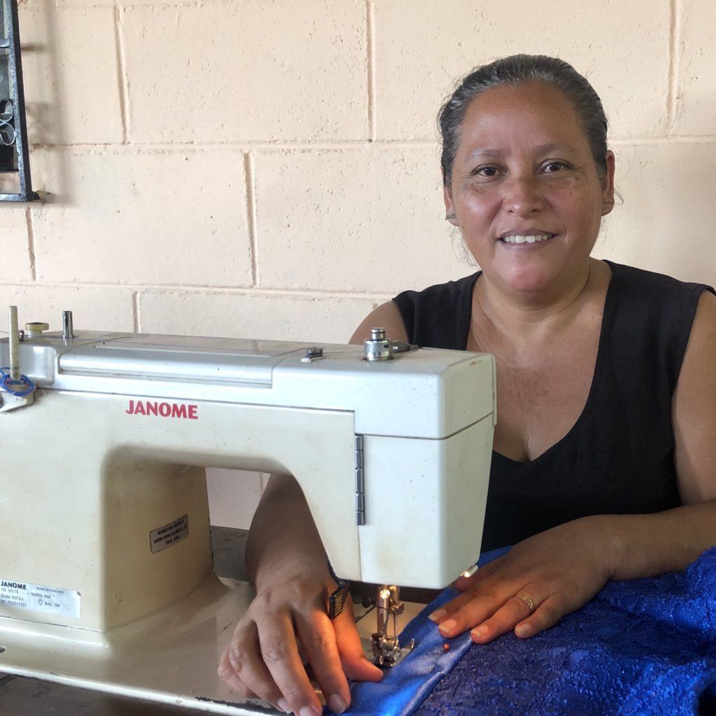 Editha at her sewing machine
